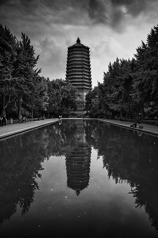 Cishousi Pagoda and its reflection in the ornamental pool at Linglong Park, Cishousi, Haidian, Beijing, China.
