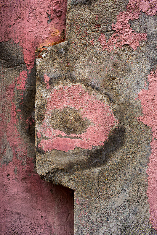 Weathered paint on a cement wall at Beijing Xiyu Unit Culture Creativity Centralization Area, Chegongzhuang S Street, Xicheng, Beijing, China.